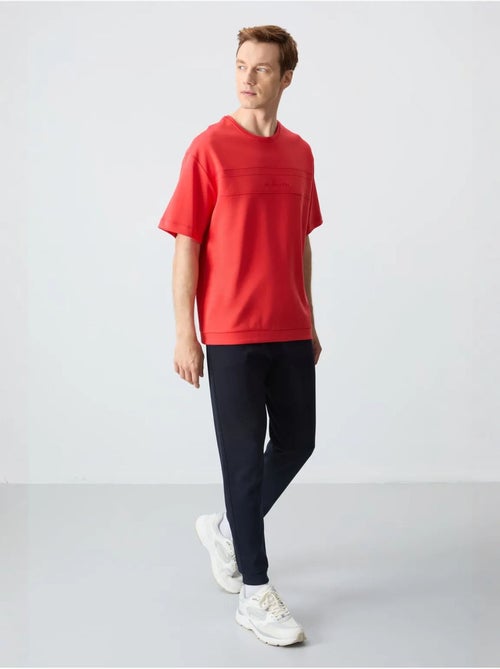 Set di t-shirt oversize e pantaloni da uomo tommy - Kiabi Set di t-shirt oversize e pantaloni da uomo tommy - Kiabi