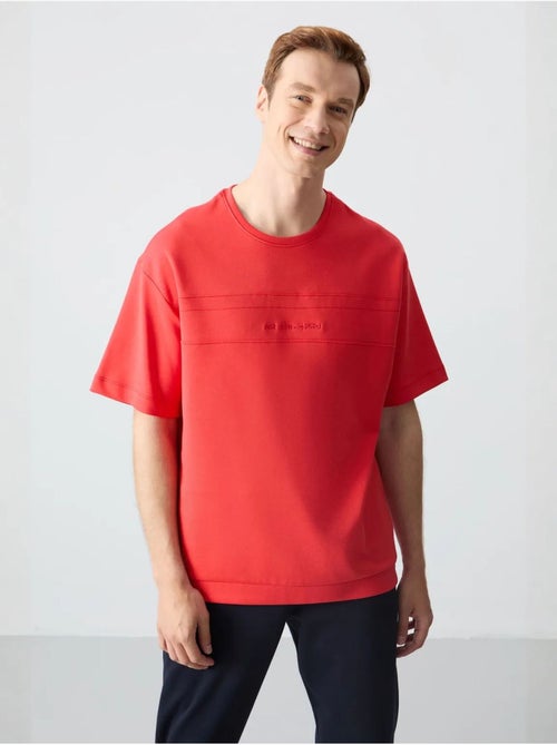 Set di t-shirt oversize e pantaloni da uomo tommy - Kiabi Set di t-shirt oversize e pantaloni da uomo tommy - Kiabi