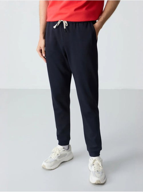 Set di t-shirt oversize e pantaloni da uomo tommy - Kiabi Set di t-shirt oversize e pantaloni da uomo tommy - Kiabi