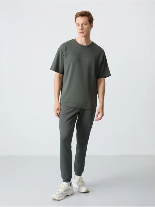 Set di t-shirt oversize e pantaloni da uomo tommy - Kiabi Set di t-shirt oversize e pantaloni da uomo tommy - Kiabi