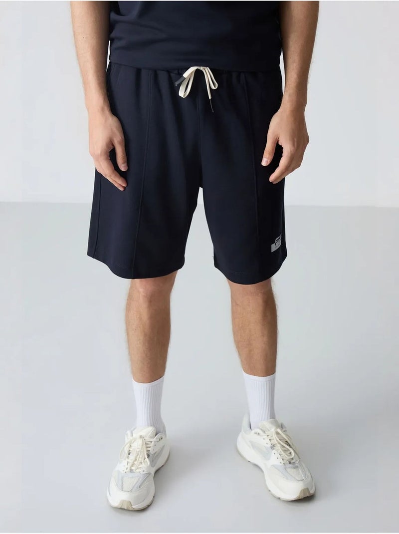Set di t-shirt oversize e shorts da uomo tommy Blu marino - Kiabi