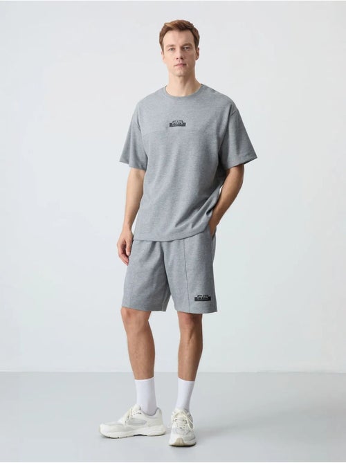 Set di t-shirt oversize e shorts da uomo tommy - Kiabi Set di t-shirt oversize e shorts da uomo tommy - Kiabi