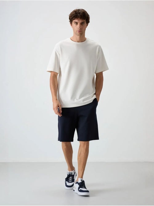 Set di t-shirt oversize e shorts tommy - Kiabi Set di t-shirt oversize e shorts tommy - Kiabi