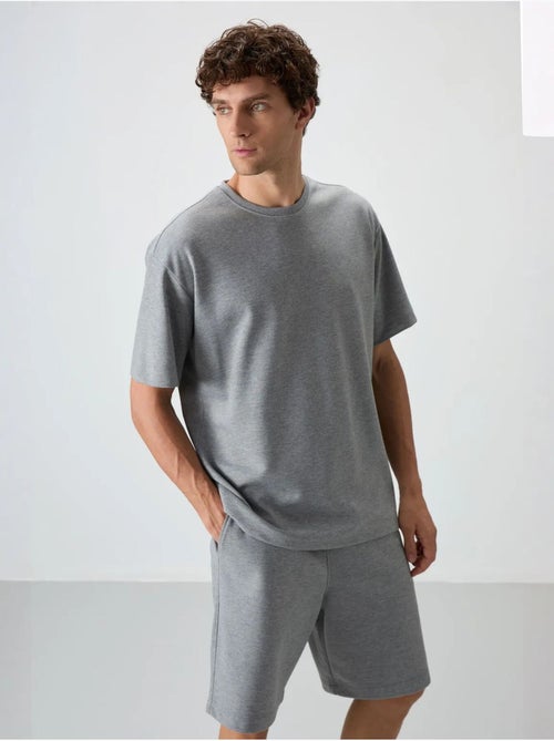 Set di t-shirt oversize e shorts tommy - Kiabi Set di t-shirt oversize e shorts tommy - Kiabi