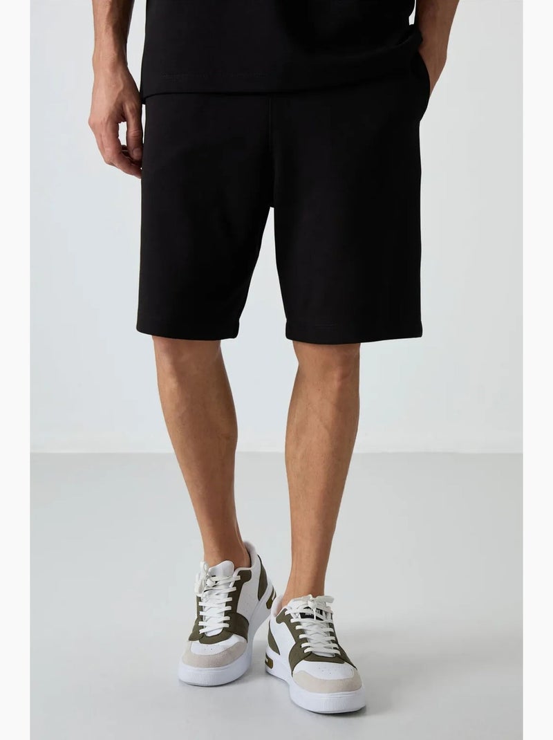 Set di t-shirt oversize e shorts tommy Nero - Kiabi