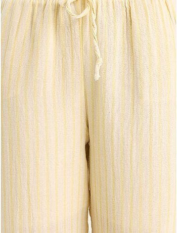 Set due pezzi a righe con scollo a v, bottoni, vita alta e gamba ampia lucci