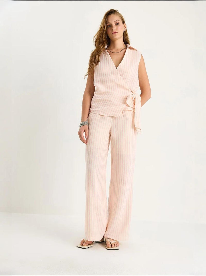 Set due pezzi a righe con scollo a v, bottoni, vita alta e gamba ampia lucci Rosa chiaro - Kiabi