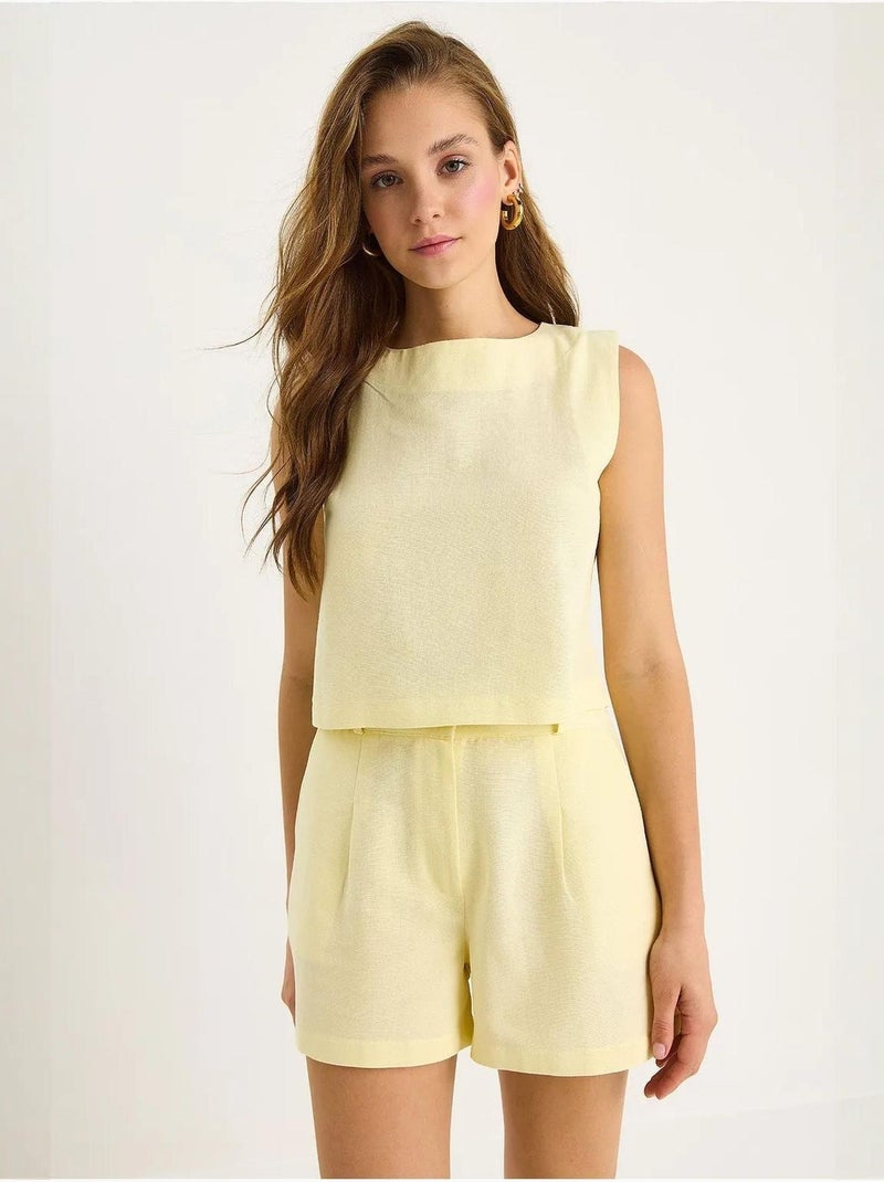 Set due pezzi a vita alta senza maniche con girocollo lucci Giallo limone - Kiabi