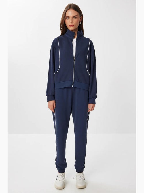 Set due pezzi con felpa con zip e jogger con dettagli di bordino a contrasto istanbul - Kiabi Set due pezzi con felpa con zip e jogger con dettagli di bordino a contrasto istanbul - Kiabi