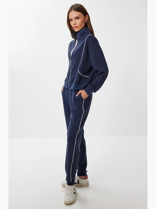 Set due pezzi con felpa con zip e jogger con dettagli di bordino a contrasto istanbul - Kiabi Set due pezzi con felpa con zip e jogger con dettagli di bordino a contrasto istanbul - Kiabi