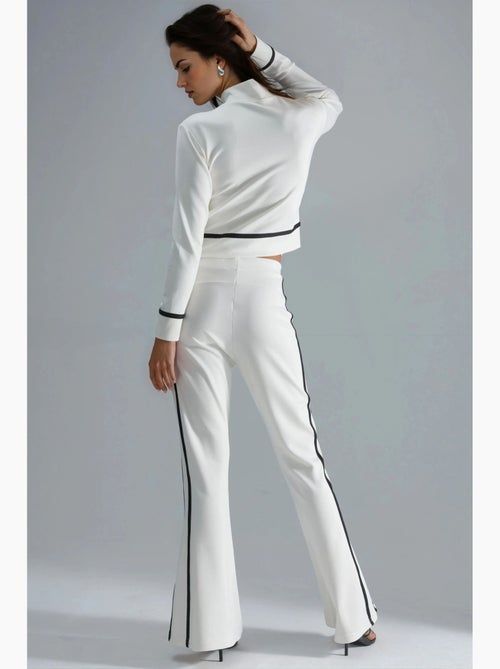 Set due pezzi con felpa con zip e pantaloni a zampa modal touch hiccup - Kiabi Set due pezzi con felpa con zip e pantaloni a zampa modal touch hiccup - Kiabi