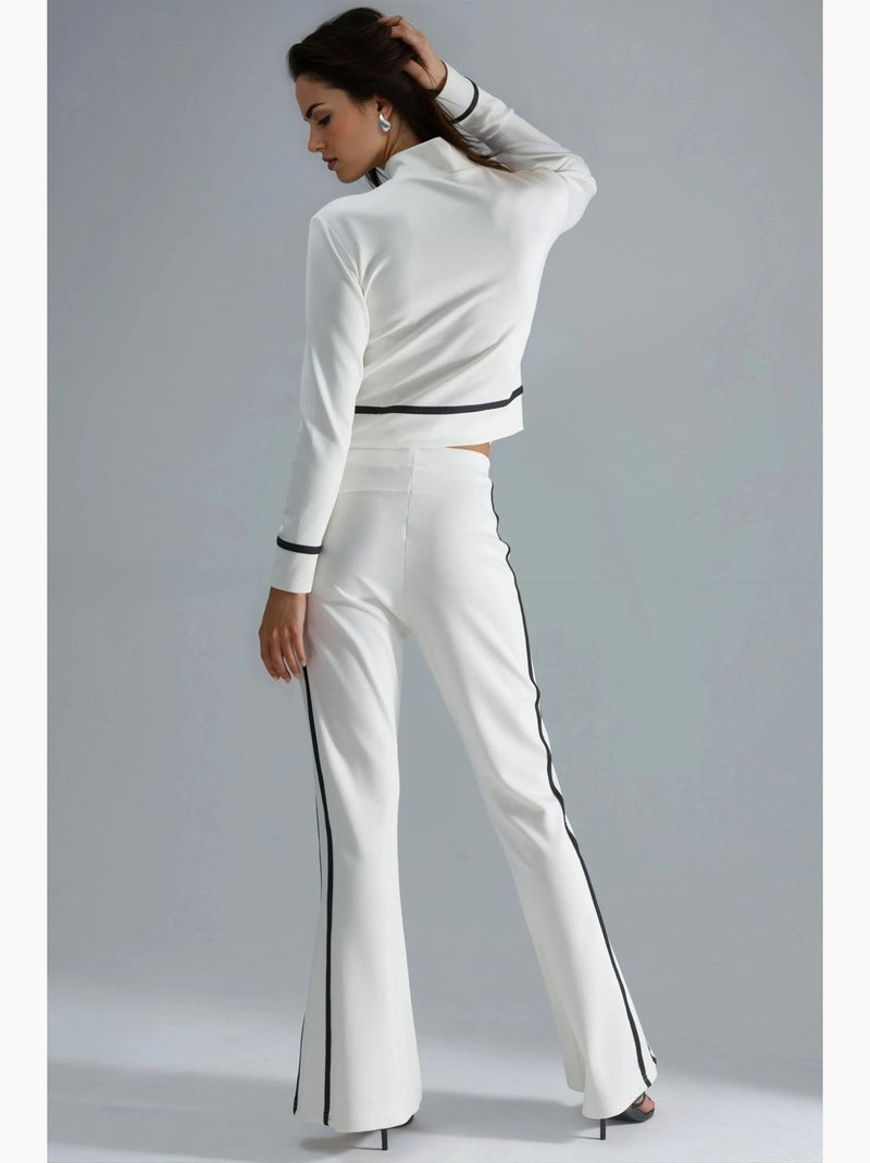 Set due pezzi con felpa con zip e pantaloni a zampa modal touch hiccup Bianco - Kiabi