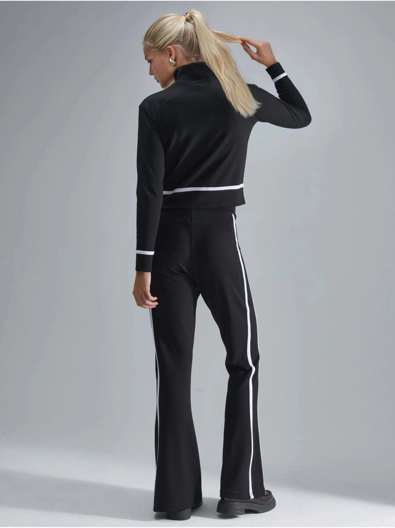 Set due pezzi con felpa con zip e pantaloni a zampa modal touch hiccup Nero - Kiabi