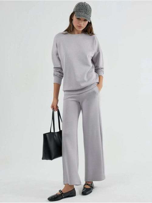Set due pezzi con felpa girocollo modal touch e pantaloni a gamba ampia hiccup - Kiabi