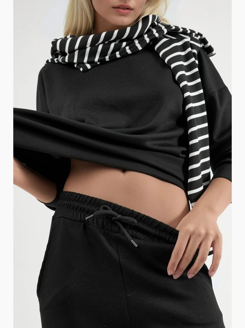 Set due pezzi con felpa girocollo modal touch e pantaloni a gamba ampia hiccup Nero - Kiabi
