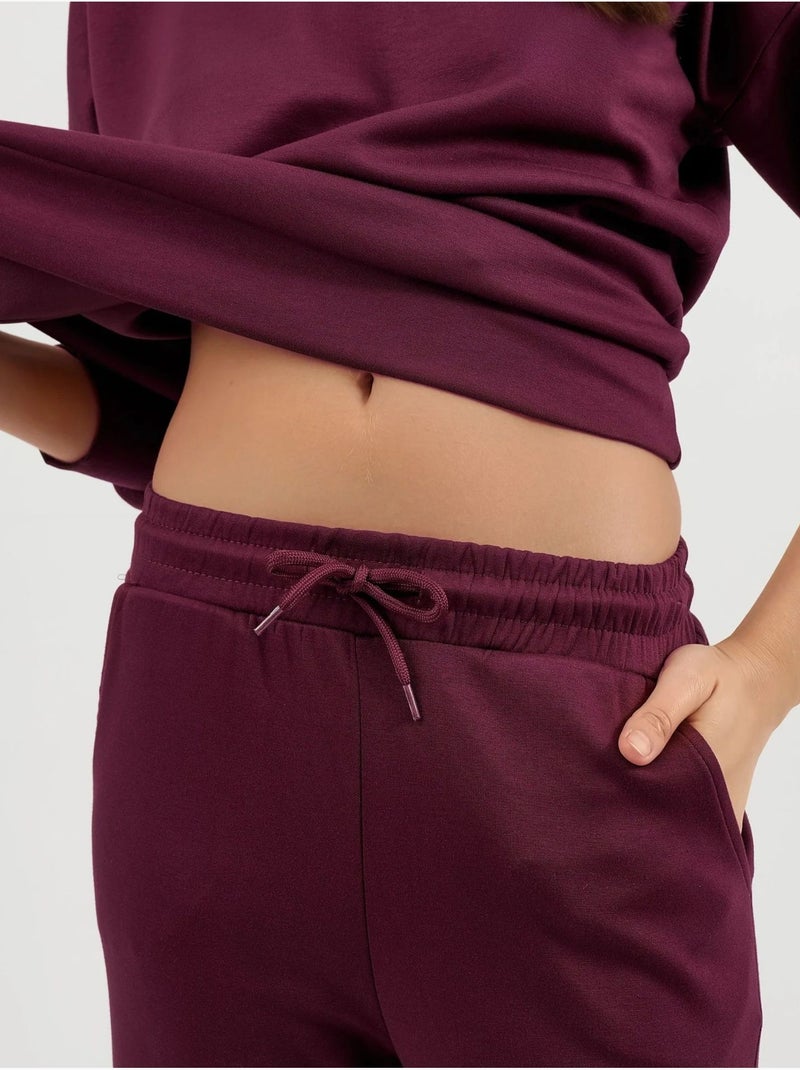 Set due pezzi con felpa girocollo modal touch e pantaloni a gamba ampia hiccup Rosso bordeaux - Kiabi