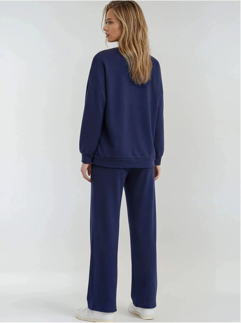 Set due pezzi con felpa girocollo ricamata e pantaloni a gamba dritta hiccup Blu marino - Kiabi