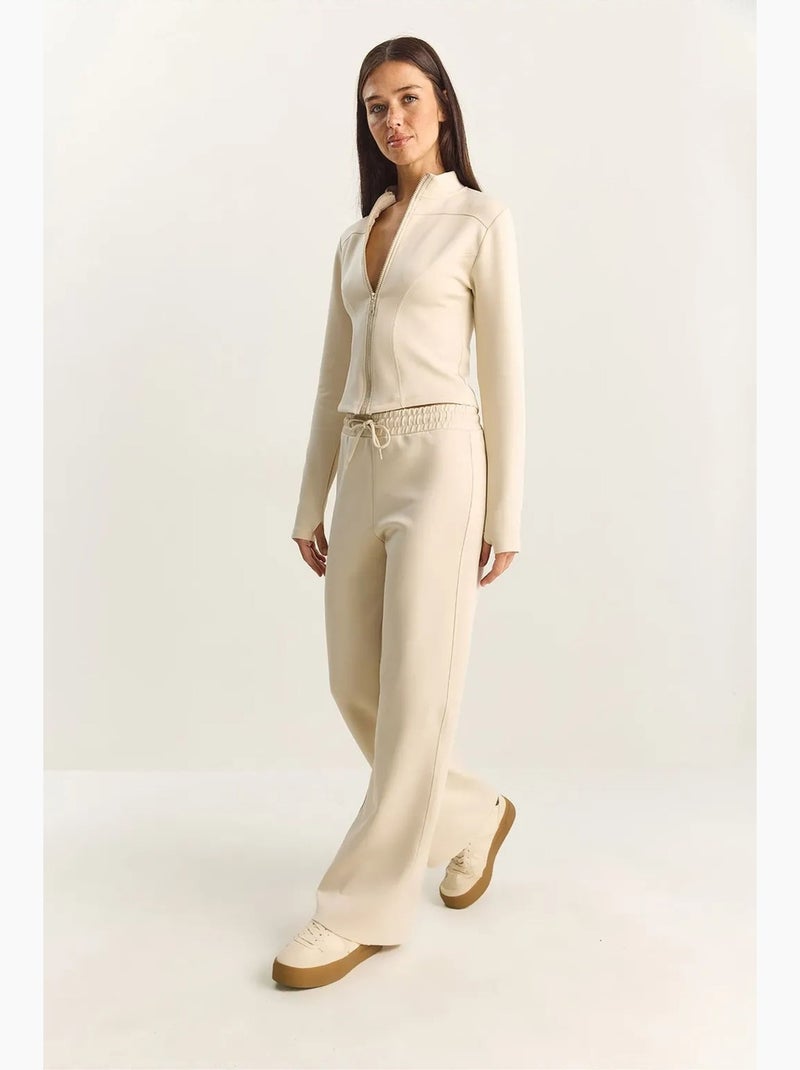 Set due pezzi con giacca e pantaloni a gamba dritta lucci Crema - Kiabi
