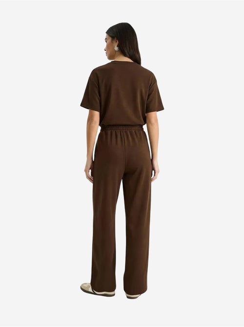 Set due pezzi con t-shirt girocollo e pantaloni lucci - Kiabi Set due pezzi con t-shirt girocollo e pantaloni lucci - Kiabi