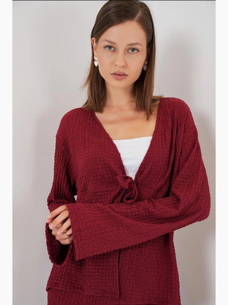 Set due pezzi con top testurizzato a maniche lunghe con scollo a v e pantaloni a zampa bdart Rosso bordeaux - Kiabi