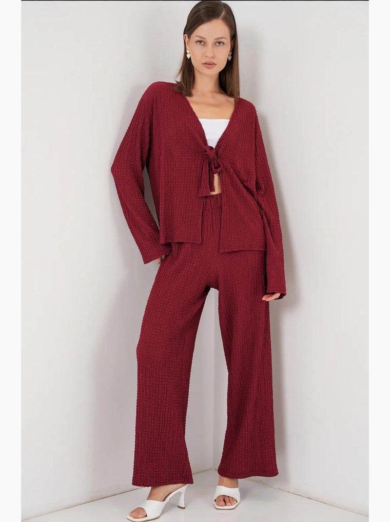 Set due pezzi con top testurizzato a maniche lunghe con scollo a v e pantaloni a zampa bdart Rosso bordeaux - Kiabi