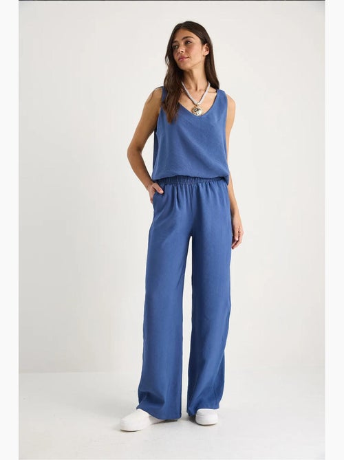 Set due pezzi in cotone con blusa scollo a v e pantaloni lucci - Kiabi Set due pezzi in cotone con blusa scollo a v e pantaloni lucci - Kiabi
