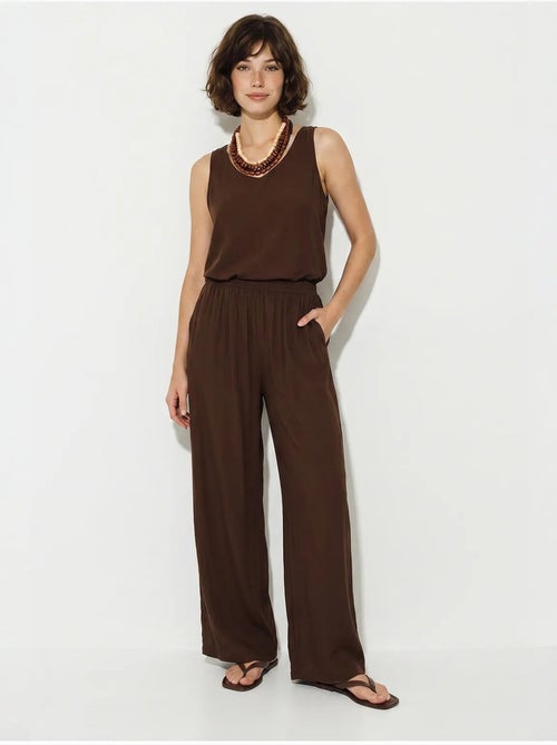 Set due pezzi in cotone con blusa scollo a v e pantaloni lucci - Kiabi Set due pezzi in cotone con blusa scollo a v e pantaloni lucci - Kiabi