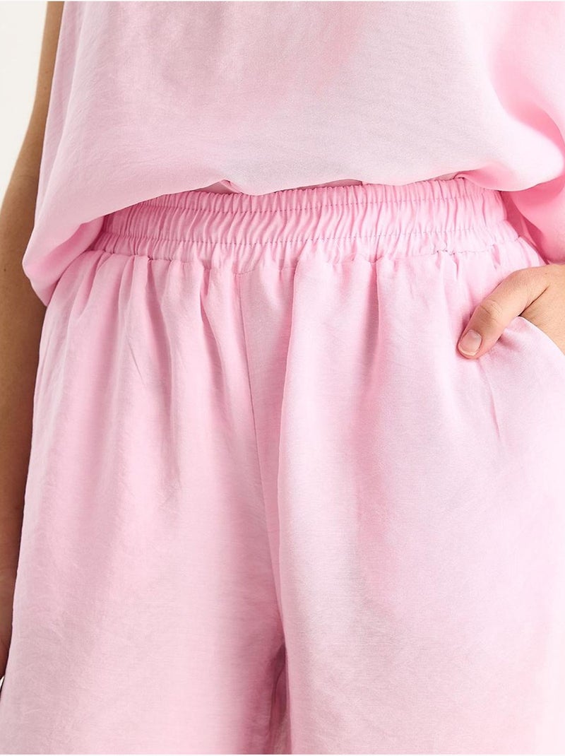 Set due pezzi in cotone con blusa scollo a v e pantaloni lucci Rosa chiaro - Kiabi