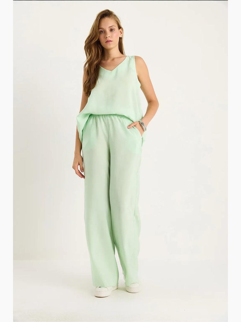 Set due pezzi in cotone con blusa scollo a v e pantaloni lucci Verde menta - Kiabi