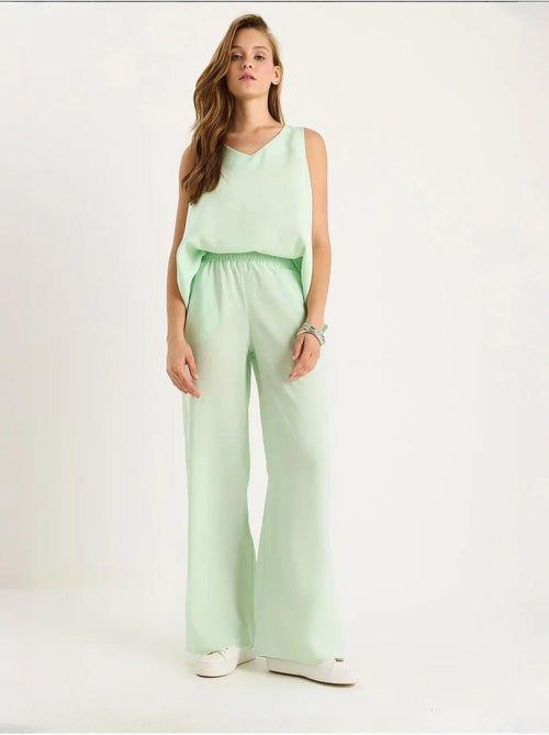 Set due pezzi in cotone con blusa scollo a v e pantaloni lucci - Kiabi Set due pezzi in cotone con blusa scollo a v e pantaloni lucci - Kiabi