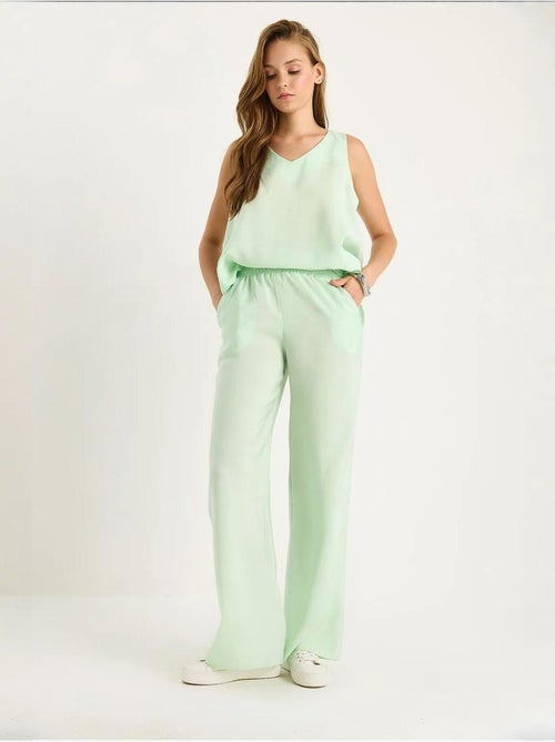 Set due pezzi in cotone con blusa scollo a v e pantaloni lucci - Kiabi Set due pezzi in cotone con blusa scollo a v e pantaloni lucci - Kiabi
