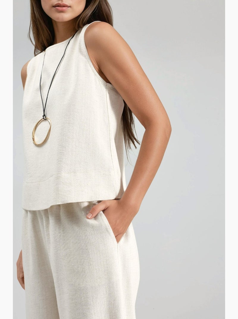 Set due pezzi in lino: blusa senza maniche e pantaloni con tasche hiccup Avorio - Kiabi