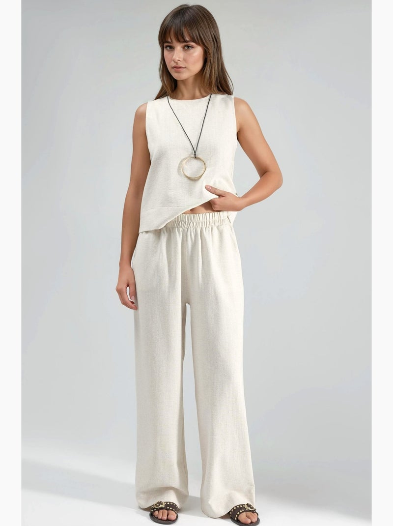 Set due pezzi in lino: blusa senza maniche e pantaloni con tasche hiccup Avorio - Kiabi