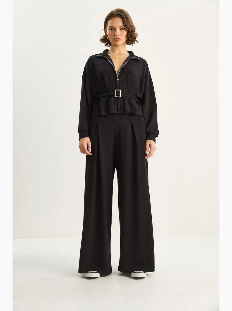 Set due pezzi in maglia con giacca con cintura e pantaloni lucci Nero - Kiabi
