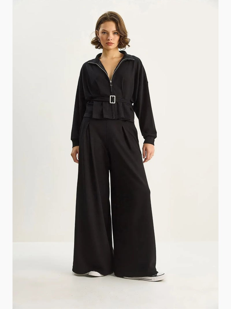Set due pezzi in maglia con giacca con cintura e pantaloni lucci Nero - Kiabi