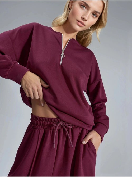 Set due pezzi modal touch con colletto con zip hiccup - Kiabi Set due pezzi modal touch con colletto con zip hiccup - Kiabi