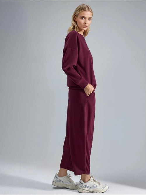 Set due pezzi modal touch con colletto con zip hiccup - Kiabi Set due pezzi modal touch con colletto con zip hiccup - Kiabi