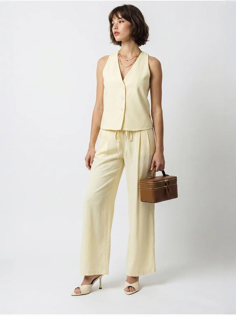 Set in cotone con gilet e pantaloni a gamba larga lucci Crema - Kiabi
