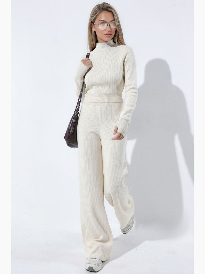 Set in maglia con maglione crop a mezzo collo alto e pantaloni hiccup Crema - Kiabi