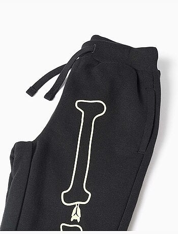 Set jogging in pile con stampa che si illumina al buio