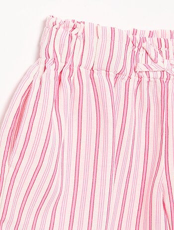 Short a tinta unita con fiocco decorativo