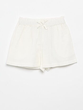 Short a tinta unita con fiocco fantasia