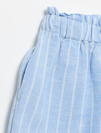 Short a tinta unita con fiocco fantasia