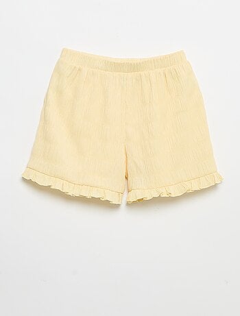 Short a tinta unita in maglia goffrata