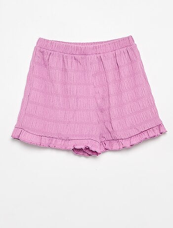 Short a tinta unita in maglia goffrata