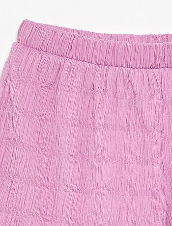 Short a tinta unita in maglia goffrata