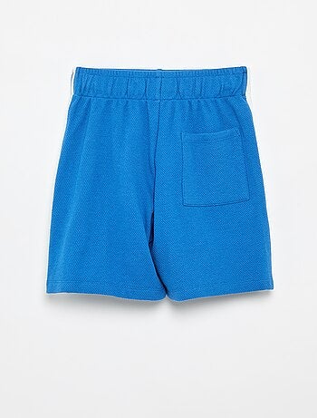 Short ampio con linee a contrasto sui lati