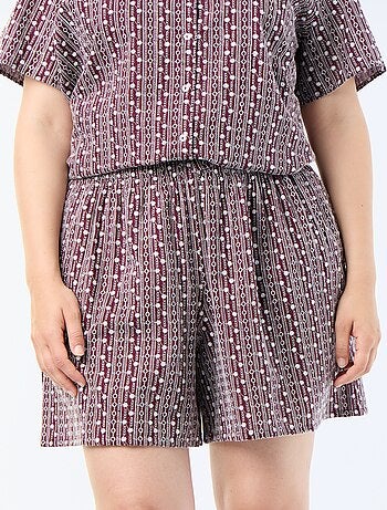 Short ampio con stampe ricamate