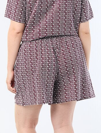 Short ampio con stampe ricamate