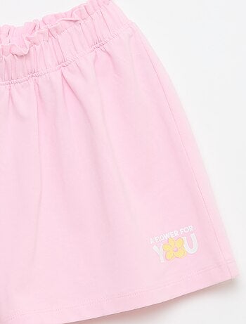 Short colorato con volant in vita